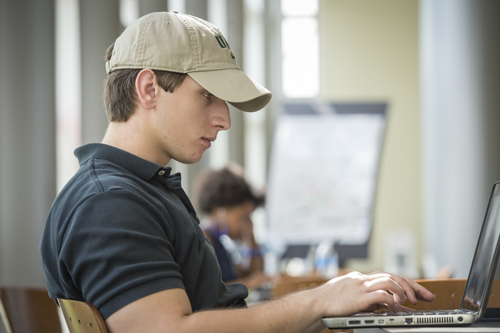 Student with laptop.