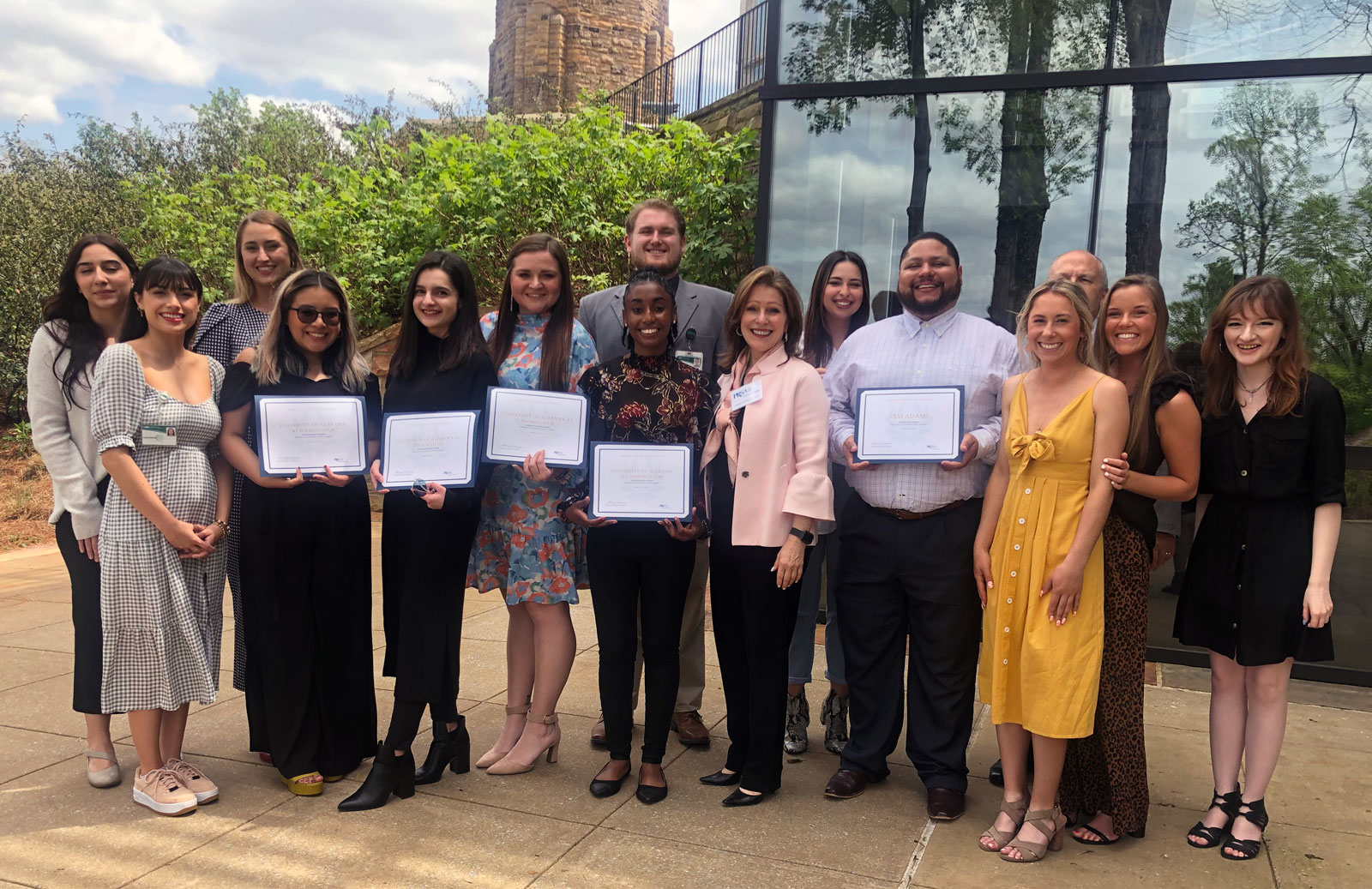 Award-winning students with their certificates. 