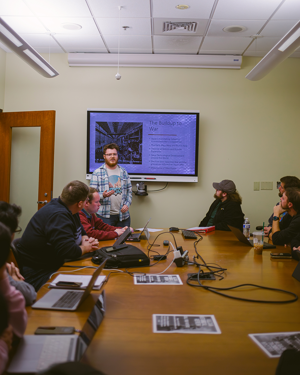"Graduate student shares presentation with class"