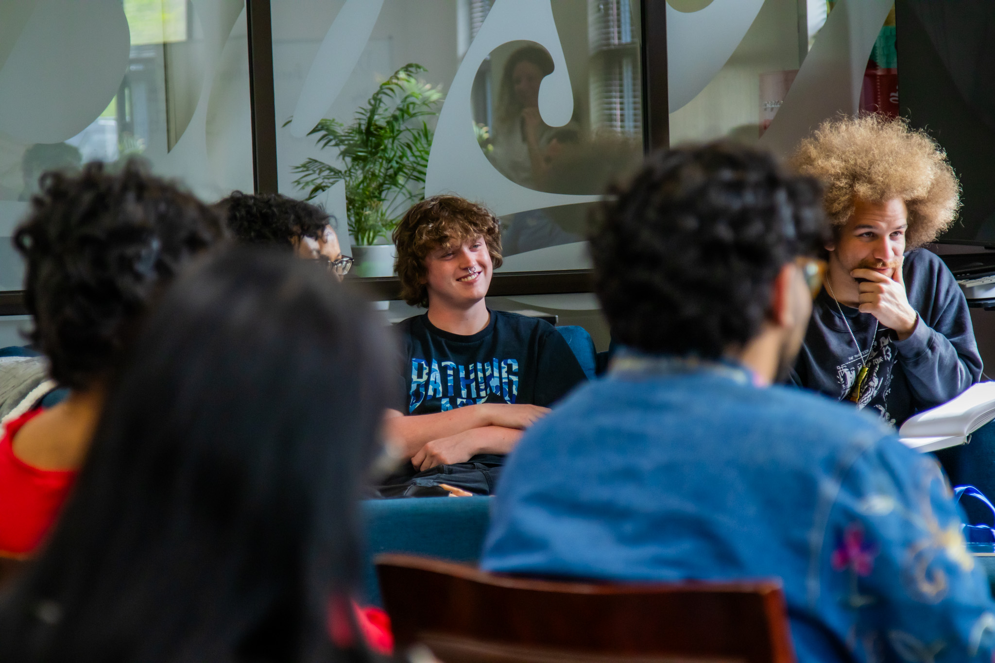 Students listen to a presentation at Bash agency