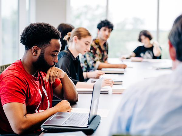 Photo of philosophy students having class in University Hall