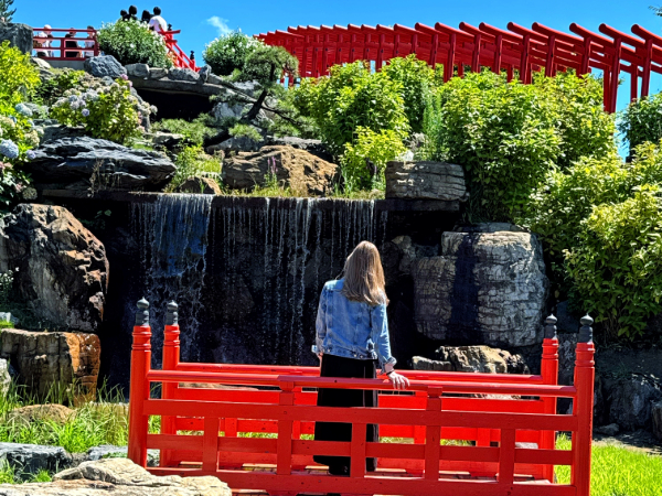 Photo of Cheyenne Haney on a red bridge