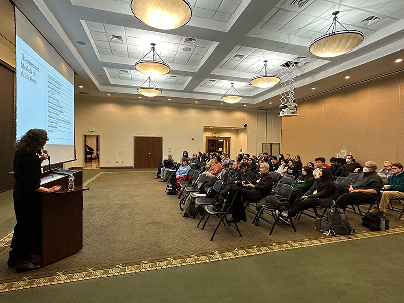 Speaker giving a lecture to a UAb Philosophy class