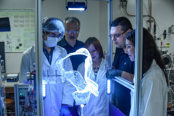 UAB Physics students participating in lab