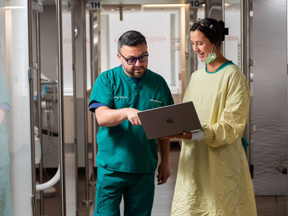 Student and Faculty working in clinic