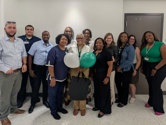 LaNeitria Head and coworkers celebrate her award