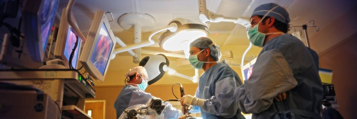 Department of Otolaryngology–Head and Neck Surgery Faculty operating on a patient