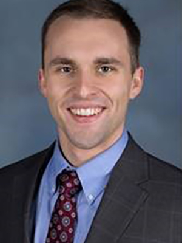 Roman Travis, M.D.