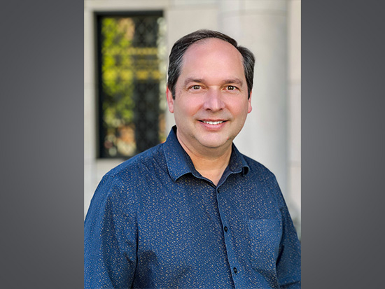 Lawrence Sincich wearing a blue shirt