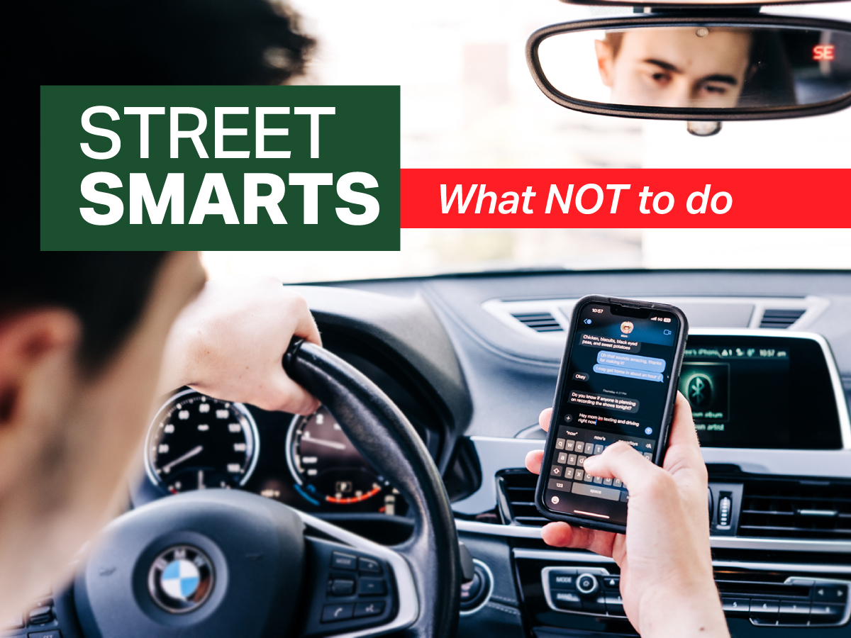 teen driving and checking text message