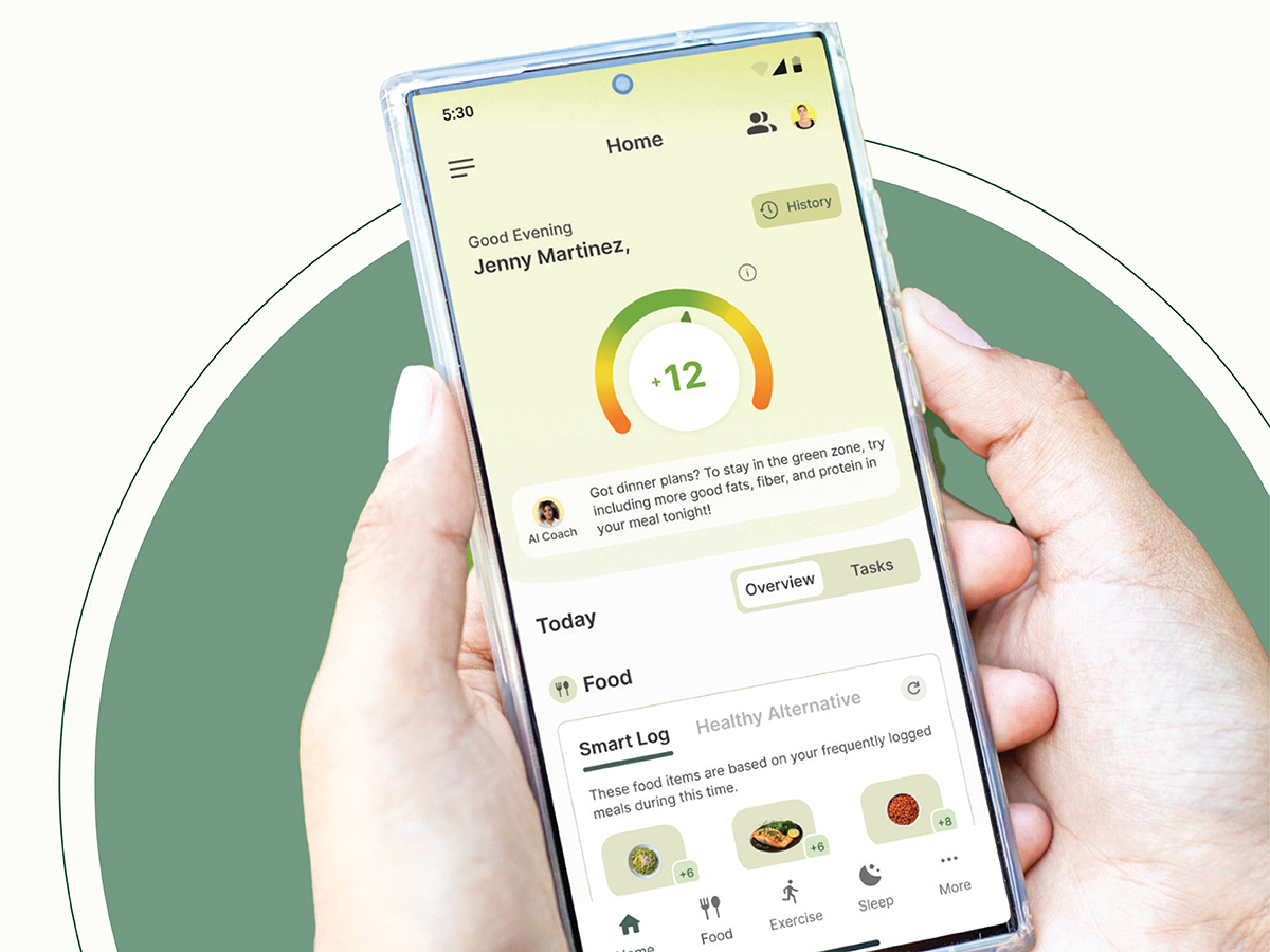 Hands holds smartphone displaying Nutu app