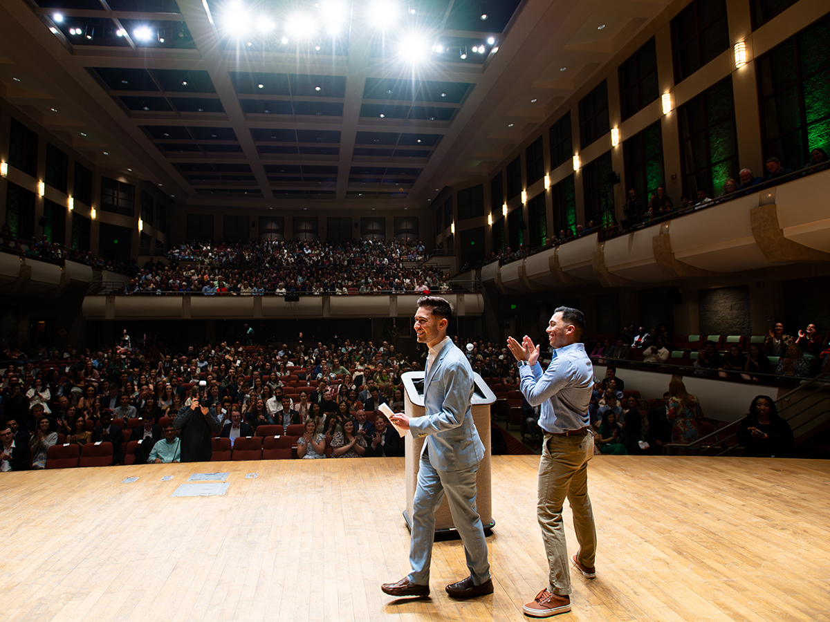 Students announce their residency locations at UAB's Match Day event as the audience at the Alys Stephens Center applauds