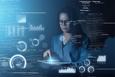 A scientist looking at data on a tablet