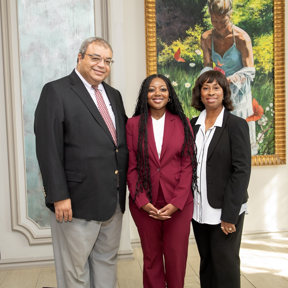 Ian McFadden, scholarship recipient Teneshia Portis, and Angela McFadden