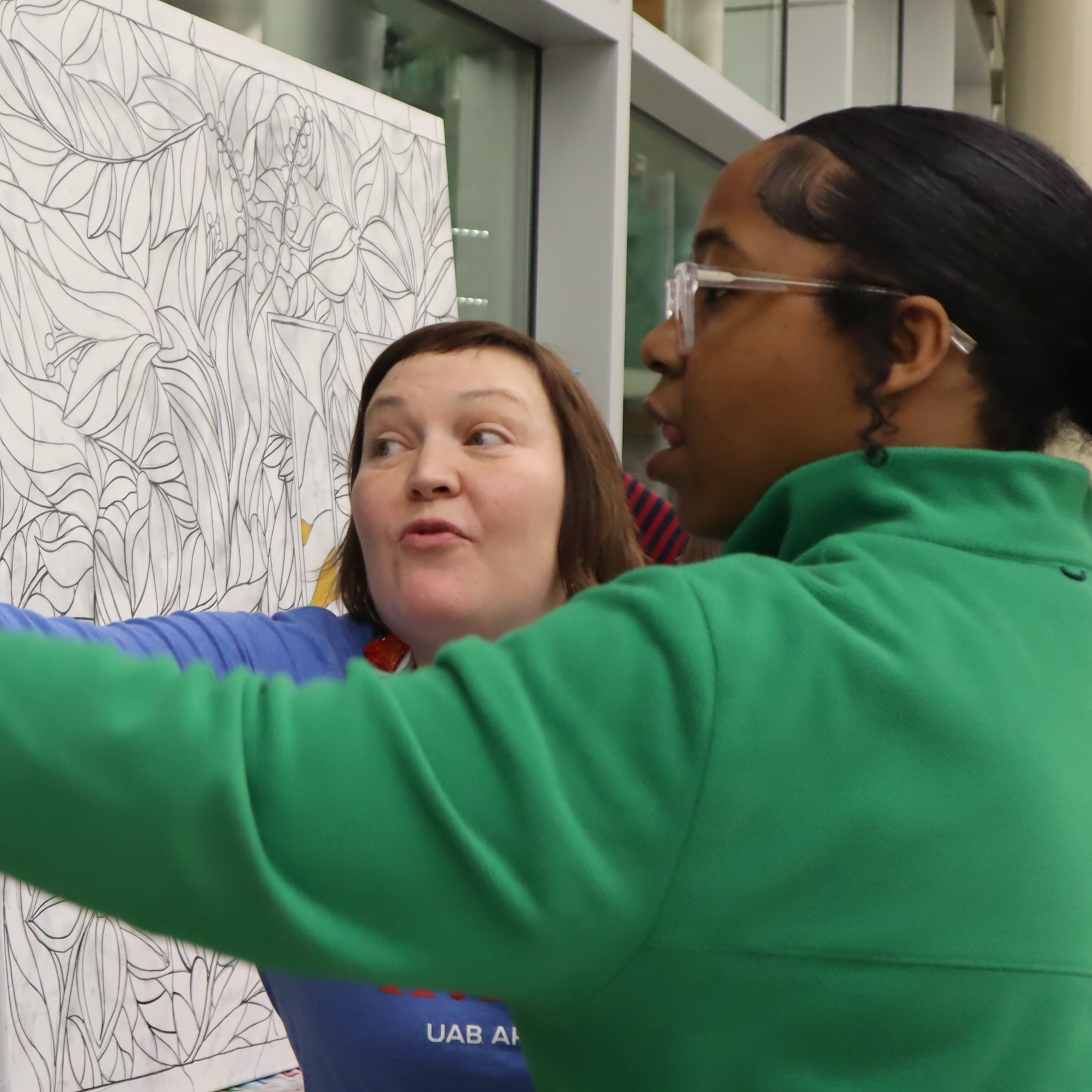 two people talking during nights in the arts event